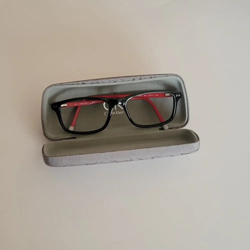 Calvin Klein CK59561 model featuring a black and red frame design 53X17X140